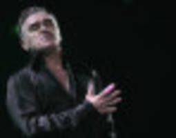 Morrissey Gets Attacked On Stage By Fans Who Take Hugging Too Far